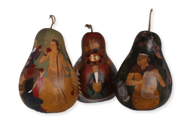 Three gourds painted by Pamunkey artist Ethan Brown.