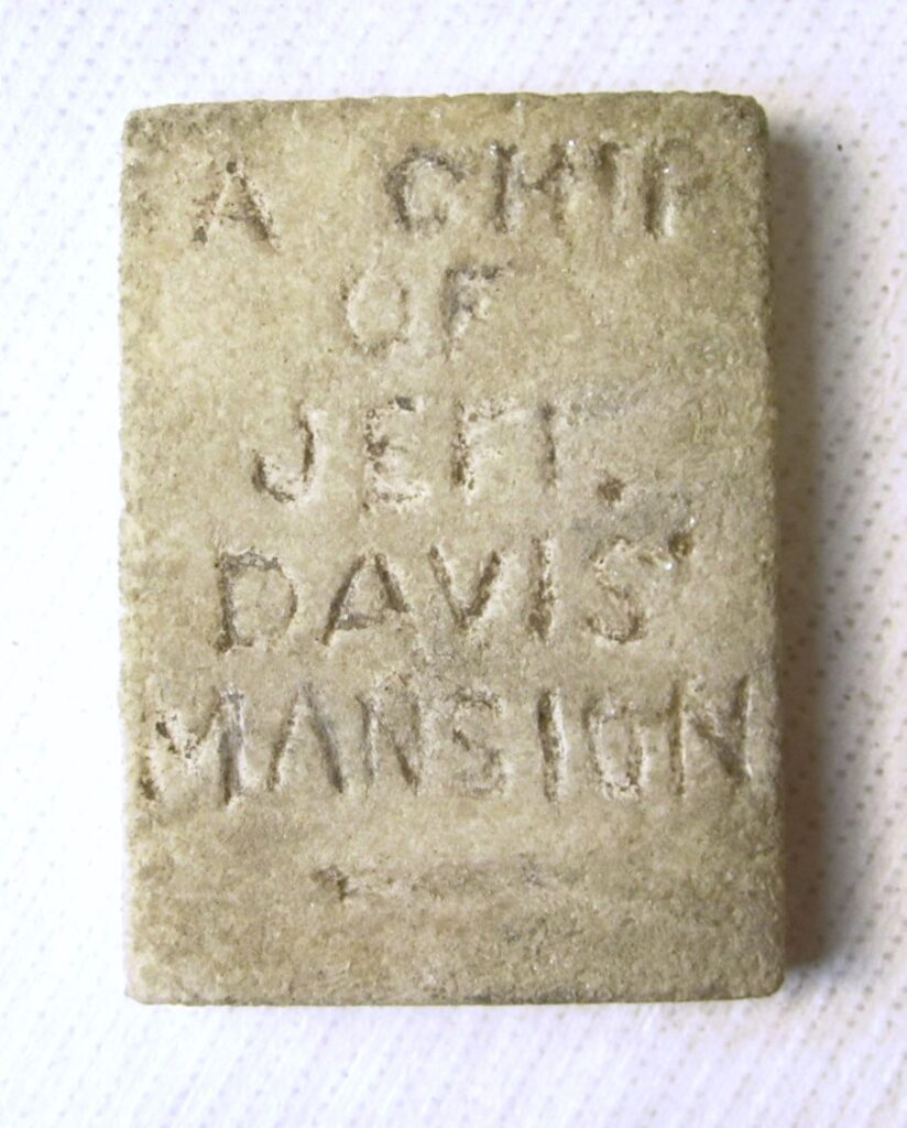Rectangular chip of white stone inscribed “A chip of Jeff Davis’ Mansion”