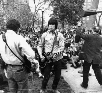 Band playing in Monroe Park to large crowd.